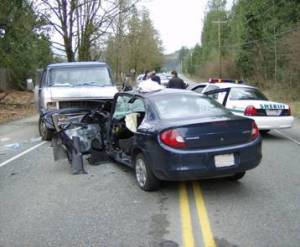 A two car head-on collision on Kent-Kangley Road resulted in a woman being airlifted to a local trauma center.
