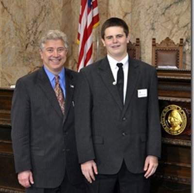 Re. Glenn Anderson and Benjamin Fisher at the House of Representatives. Benjamin served as a page for Anderson during the legislative session.