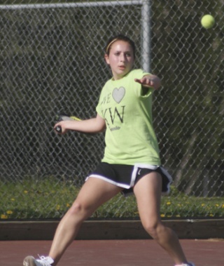 Kentwood's Tess Manthou prepares to return a volley from Tahoma's Kelly Lehigh Friday at Tahoma High. Mantou won the singles match 1-6