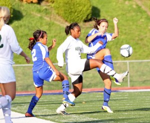 Kentwood's Mykala Benjamin fights for possesion against Tahoma's Brie Hooks