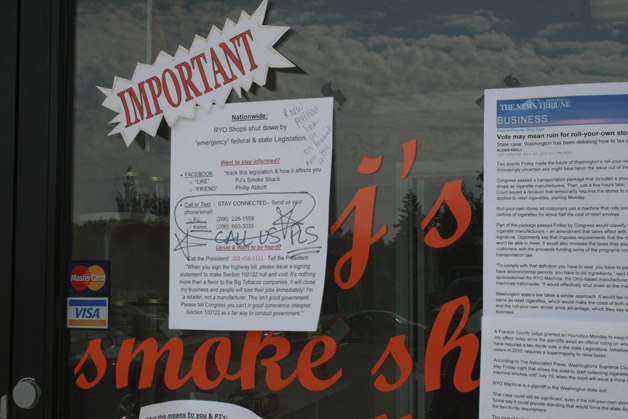 A sign posted outside PJ's Smoke Shack.