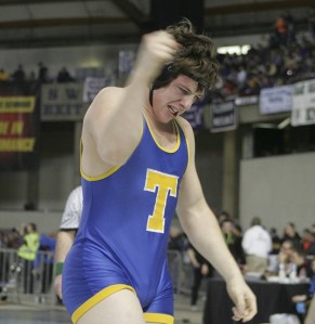 Adam Hokenson from Tahoma celebrates after pinning Aaron Ibanez from Bothel  in the semifinal round at the Mat Classic Saturday.