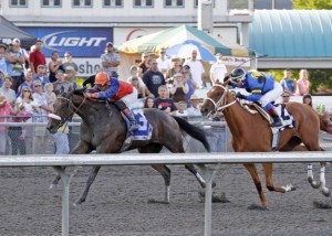 Sweet Saga rallies to the lead in the Barbara Shinpoch Stakes at Emerald Downs.