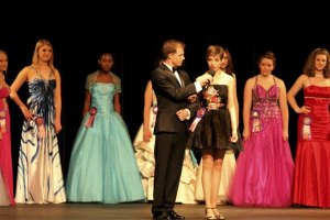 Lane Lindblom accepts third place at the Miss Jr. Teen Seattle pageant competition. Lindbom