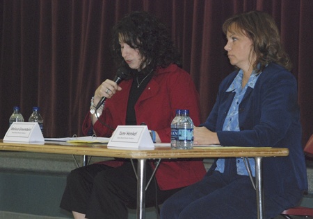 Tahoma School Board member Tami Henkel listens to her challenger
