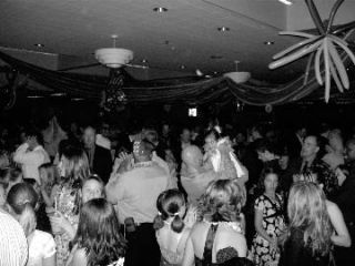 Dads and girls crowd the dance floor during Tahoma Learning Community’s Father-Daughter Ball.