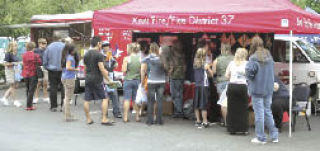 Booths such as this one for Fire District 37 at last year’s festival will be part of Covington Days this weekend.
