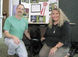 Don and Kelli Reiter led a recruitment event at Covington Library July 22 for prospective trainers of guide dogs for blind people.