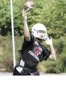 Kentlake quarterback Lewi Larson missed most of last season with a shoulder injury