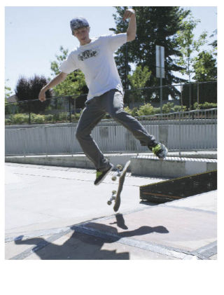 Johnny Hill casts a shadow as he kick-flips onto the pyramid at the skate park in Covington. It’s a summer pasttime that will end next week when students in the Tahoma and Kent school districts head back to school on Sept. 2.