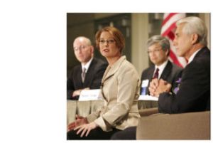 U.S. Rep. Dave Reichert listens while his election opponent