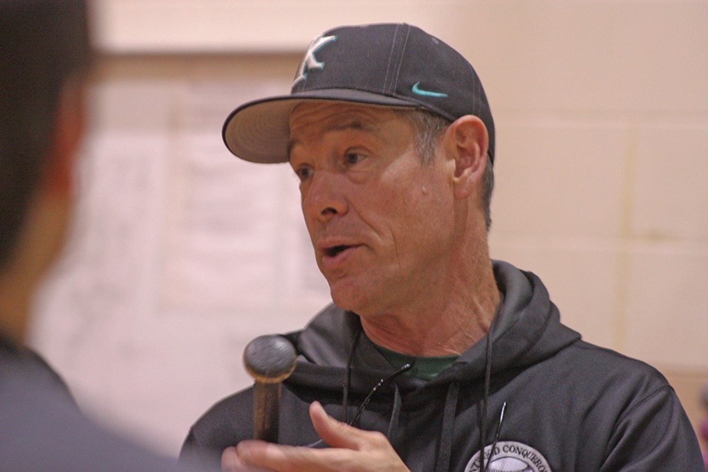 Kentwood coach Mark Zenders talks to his players at batting practice on Monday afternoon. The Conquerors are preparing to face Walla Walla in a state Class 4A opener Saturday in Puyallup. MARK KLAAS