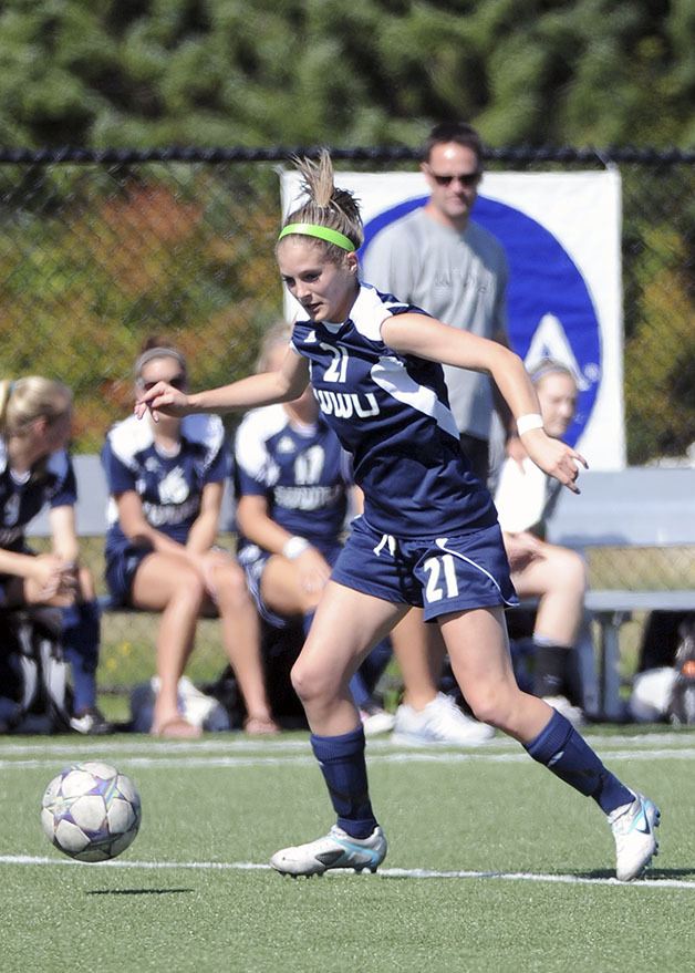 Kentlake graduate Katherine Miccile dribbles the ball during a Western Washington womens soccer match.