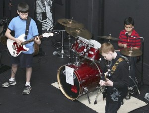 Members of Heat perform during Dace’s Rock ‘n’ More’s spring Rockcital in March. They will judge Pull Together’s inaugural Battle of the Bands.