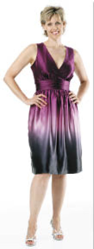 Janice McCurley of Maple Valley is seen here as she’s pictured in a photo display at the downtown Seattle Macy’s store of participants in the Breast Cancer Survivor Fashion Show