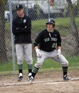 Kentwood’s Reese McGuire takes a lead off third base during a game against Auburn in the spring. McGuire