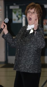 Collen Starr reacts when Rock Creek Elementary third graders respond enthusiastically about doing another fundraiser for Vine Maple Place