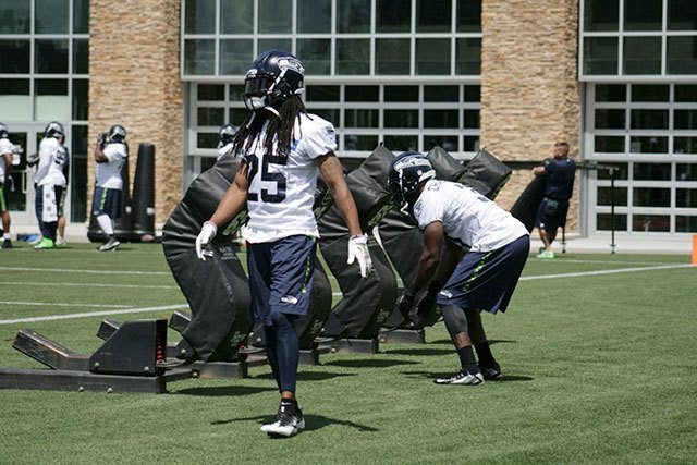 Seattle Seahawk Cornerback Richard Sherman and Strong Safety Kam Chancellor work out at the Virginia Mason Athletic Center in Renton during the summer. File photo by Sarah Brenden