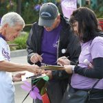 Maple Valley resident and advocate Ken Geisen signs people up to be advocates at the Seattle Walk to End Alzheimer&rsquo;s this year. Courtesy photo from the Alzheimer&rsquo;s Association Washington State Chapter.