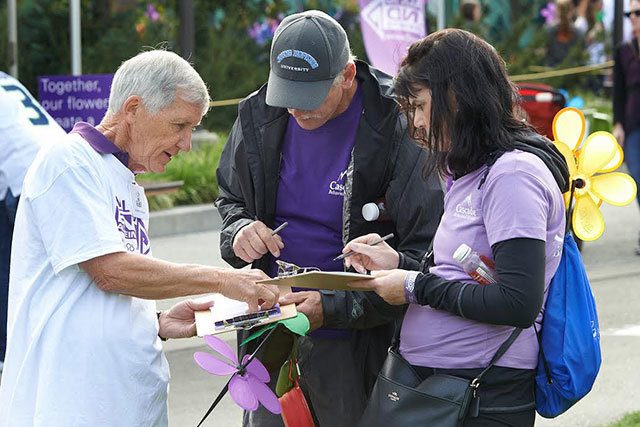 Maple Valley resident and advocate Ken Geisen signs people up to be advocates at the Seattle Walk to End Alzheimer&rsquo;s this year. Courtesy photo from the Alzheimer&rsquo;s Association Washington State Chapter.