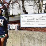 Kentwood senior Alexia Thomas was named CenturyLink High School Athlete of the Week. On Nov. 10 she was presented with two game tickets, a jersey, Seahawks football and a $1,000 check for Kentwood&rsquo;s Athletic Department. Contributed photo