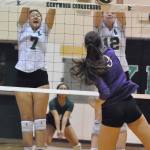 Kentwood&rsquo;s Alvina Ngo, left, and Erin Gould attempt to block a shot by Puyallup&rsquo;s Kaitlin Sugai during district action Nov. 5 in the Conquerors gym. RACHEL CIAMPI, The Reporter