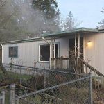 Firefighters rescue man from Kent mobile home fire