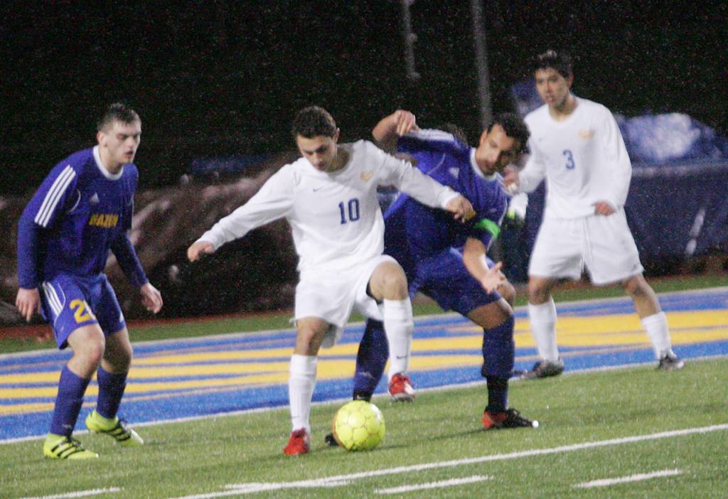 Tahoma takes down Hazen in rainstorm | Boys Soccer