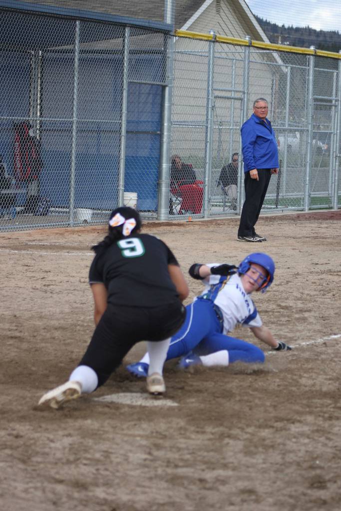 Hazen senior Tessa DeBartolo was called safe after sliding into homeplate Thursday.