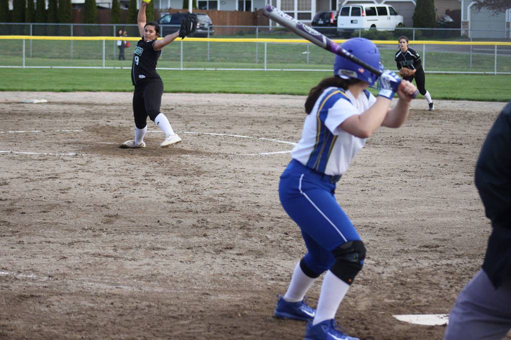 Kentwood junior Lagi Palaita winds up during the Conks 14-4 win over the Highlanders.