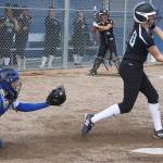 Kentwood freshman Kaci Imus swings for a pitch midway through Thursday&rsquo;s game at Hazen. SARAH BRENDEN, The Reporter