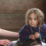 Kids play with ponies during Western Days at Reber Ranch