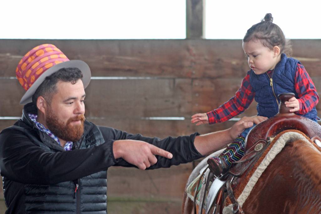 Kids play with ponies during Western Days at Reber Ranch