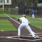 Tahoma senior Connor Kiffer lays down a bunt Wednesday along the third baseline.
