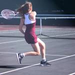 Amy Bender from Kentlake volleys during her win over Kentwood&rsquo;s Brianna Stroud. Bender won the match 6-2, 6-0.