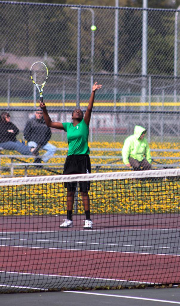 Chiamaka Okafor prepares to serve the ball Wednesday. Okafor won 6-1, 6-2 over Katie Valerio.