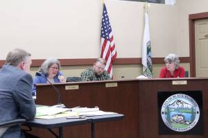 Pat Pepper, Brian Weber and Erika Morgan (not pictured) passed a resolution at the May 2 council meeting that bars the city from moving forward with Oakpointe&rsquo;s attempt at arbitration over a breach of a development agreement. David Linehan, the city&rsquo;s attorney, said he will move forward in the arbitration proceedings until he received clarification about the resolution. Photo by Ray Still