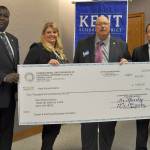 IBEW Local 46 recently presented the Kent School District with a $4,600 donation for its Career and Technical Education program. From left are Sean Bagsby, president of IBEW Local 46; Lorianne Paxton, Kent School District&rsquo;s director of Career and Technical Education; Jim Tosh, IBEW Local 46&rsquo;s business manager and financial secretary; and Eric Hong, school improvement officer for the Kent School District. HEIDI SANDERS, Kent Reporter