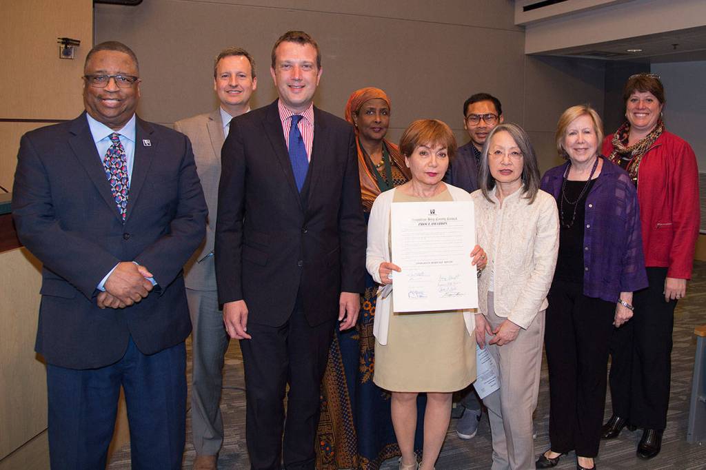 Representatives from the King County Immigrant and Refugee Task Force, the Refugee Women&rsquo;s Alliance, Coalition of immigrants, Refugees and Communities of Color, the Chinese Information and Service Center join Councilmembers after the Council proclaimed June Immigrant Heritage Month in King County. (Courtesy Photo)