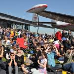 The crowd looks to the sky to catch a glimpse of the moon eclipsing the sun. HEIDI SANDERS, Reporter