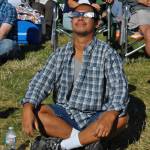 Tiger Keo, of Renton, looks at the eclipse. HEIDI SANDERS, Reporter