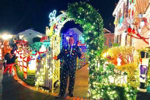 Man brings holiday cheer by decorating homes
