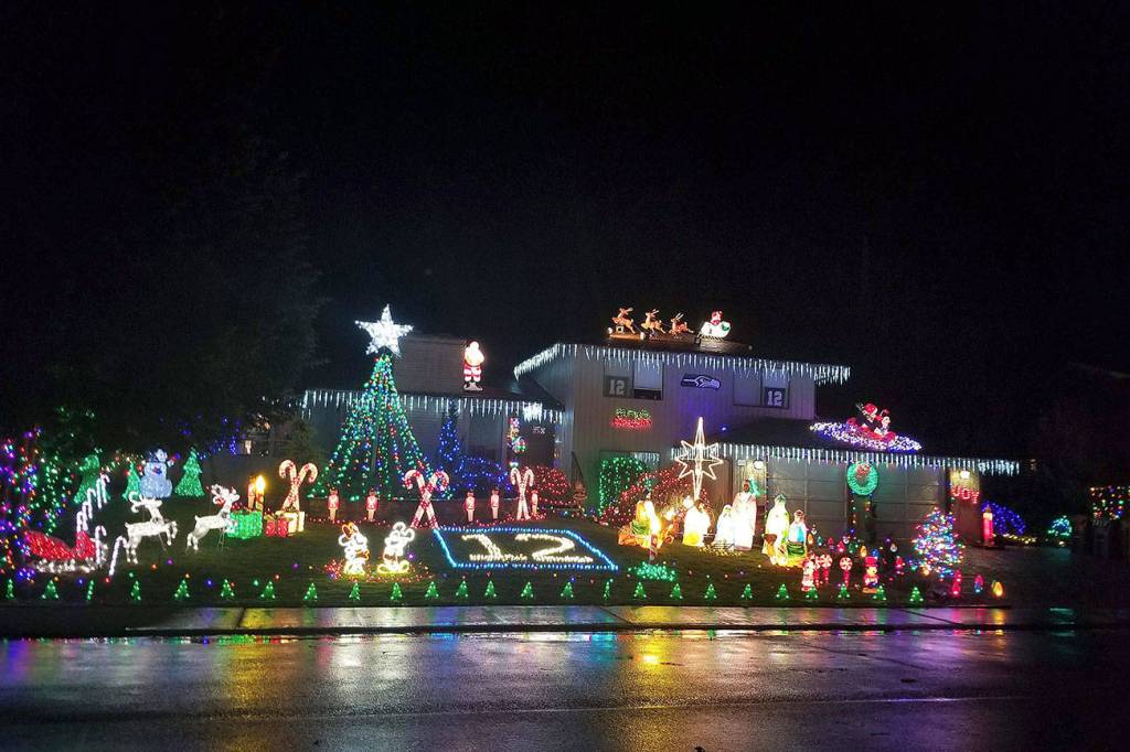 Man brings holiday cheer by decorating homes
