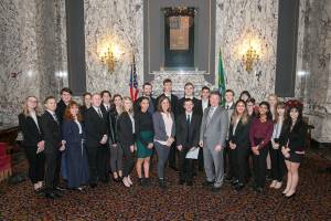 Students from Tahoma High Schools We the People team join Sen. Mark Mullet, D-Issaquah, and Sen. Joe Fain, R-Auburn, on Feb. 7, 2018 in the Washington State Capitol building shortly after the Senate approved a resolution honoring the team.