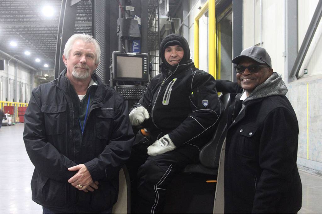 From left, Jeff Smith, Sergey Alter and Joseph Drake pose for a photo. Leah Abraham, Renton Reporter