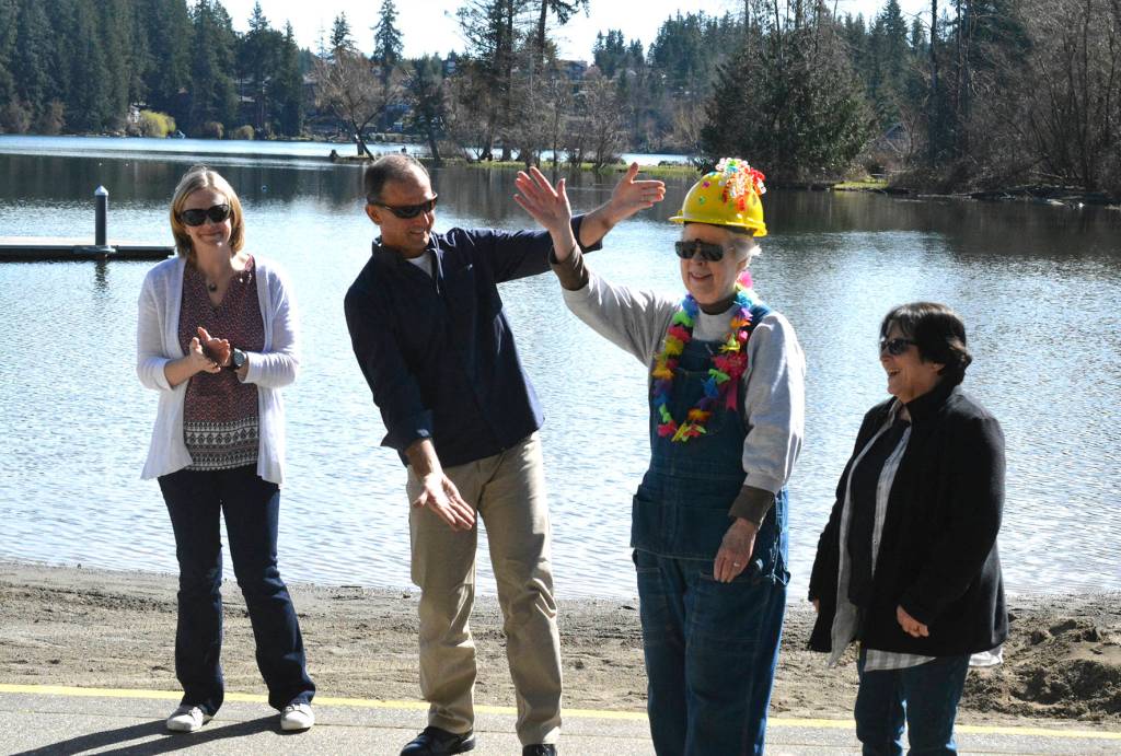 Linda Johnson waves to everyone as Mayor Sean Kelly announces her birthday to the crowd. Photo by Kayse Angel