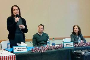 Dr. Shannon Hader, a candidate for the 8th Congressional District seat, fields a question as her opponents, Jason Rittereiser and Kim Schrier, look on during their forum in Auburn on March 16. ROBERT WHALE, Auburn Reporter