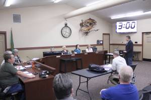 Raegan Dunn spoke with the Black Diamond City Council during the May 3 meeting, presenting his own version of the State of the County. Photo by Ray Still