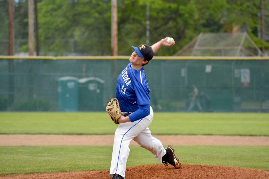 Tahoma senior Nick Dazell pitches during Tuesdays 5-4 win over Kentridge. Photo by Kayse Angel