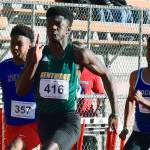 Kentridges Solomon Hines dashes to victory in the 100 meters at 10.87 seconds. RACHEL CIAMPI, Kent Reporter